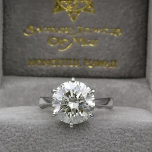 5.00 carat round brilliant ideal cut diamond ring in platinum 6 prong solitaire setting.