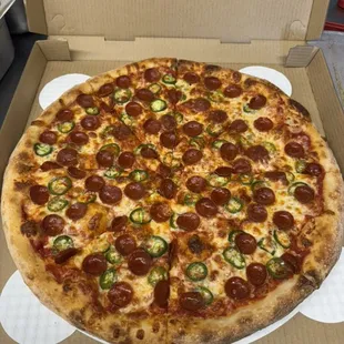 NY style 18" Peñoroni. red sauce, pepperoni, fresh jalapeños and Mike's Hot Honey.