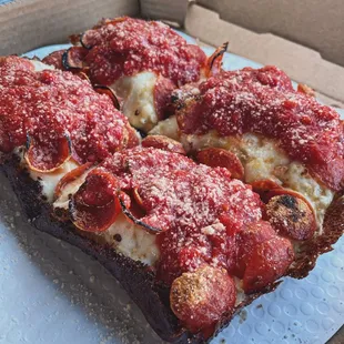 Detroit style pizza with pepperoni