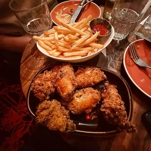 Chicken wings and fries