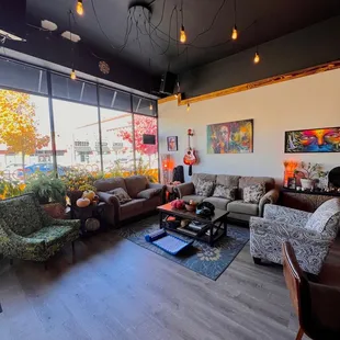 a living room with a view of the city