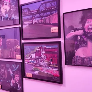 a wall of paintings