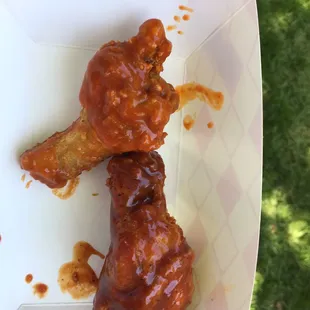 Kiki&apos;s wings top: honey barbeque Bottom: BBQ sauce