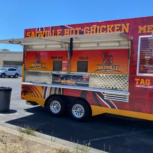 a food truck parked in a parking lot
