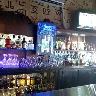 a bar with a variety of liquors