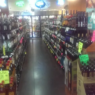 the aisle of a liquor store