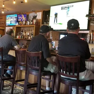 The &quot;bar&quot; seats 10.  But you can watch sports on TVs anywhere you sit.