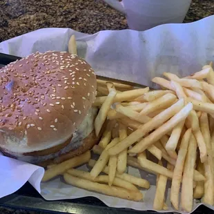 Hwy 155 burger with Swiss cheese and an onion ring.