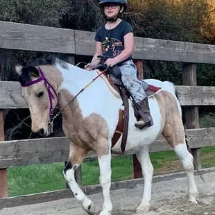 Riding S&apos;mores during her horseback riding lesson