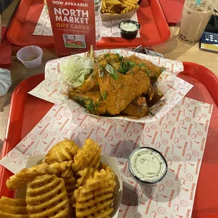 Chicken wings and fries