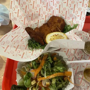 Schnitzel and salad
