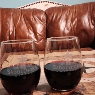 two glasses of wine on a table