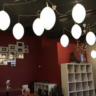 a dining area with tables and chairs