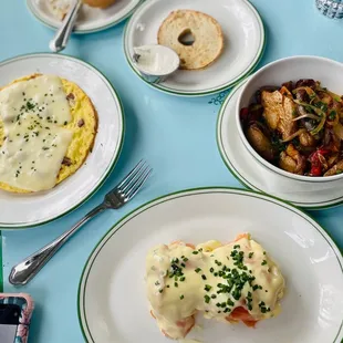 Eggs Benedict / omelet / potatoes