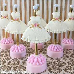 Pretty Pink, White and Gold Wedding dress form chocolate covered Oreo&apos;s.