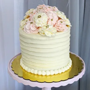 Pretty ribbon cake with delicate flowers
