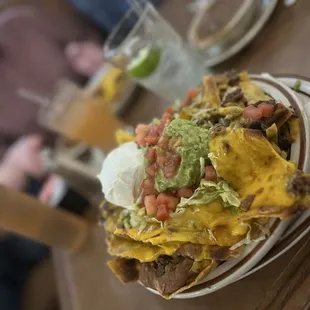 Small nachos with spicy ground beef.
