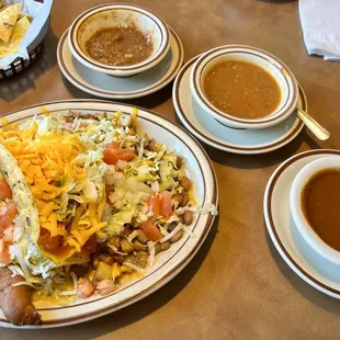 Lunch combo with Chile relleno, chicken enchilada and shredded beef taco. Christmas on the side.
