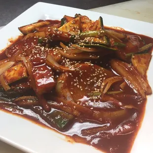 Streamed Butterfish - butterfish steamed in our korean spicy sauce along with radish (daikon), onions, squash, and green onions.