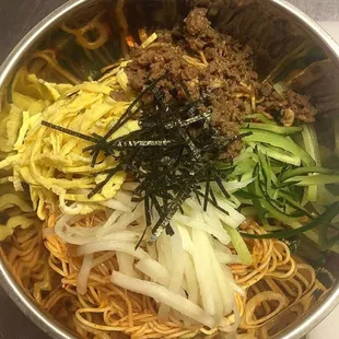 Bibim Kooksoo - Cold somen noodles mixed with cabbage, bean sprouts, choi sum, bbq beef, egg, cucumber, daikon radish, and nori seaweed.
