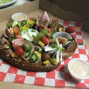 Our Huge Loaded Bavarian Soft Baked Pretzel with homemade PBR Cheese Sauce