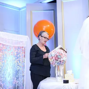 Our local Austin officiant, Spike Gillespie, doin her job