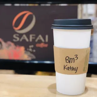 a cup of coffee on a table