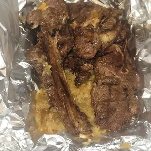 Grill lamb over sweet onion