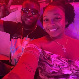 a man and a woman posing for a picture