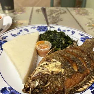 fried fish with ugali and collard greens