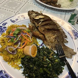 fried tilapia, pilau, collard green