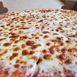 a cheese pizza in a box