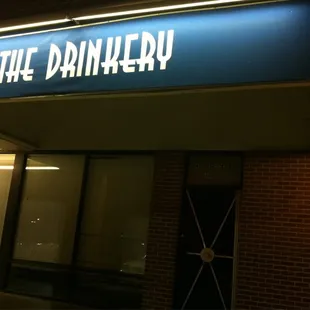 the entrance to the drinkery