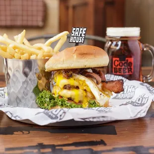 a burger and fries on a table