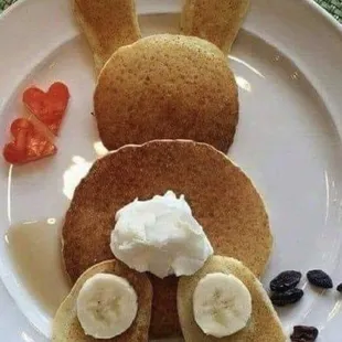 a plate of pancakes with a bunny on it