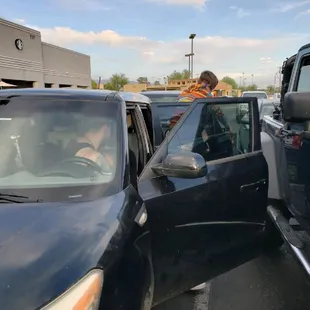 Thieves loading unpaid groceries in the car.
