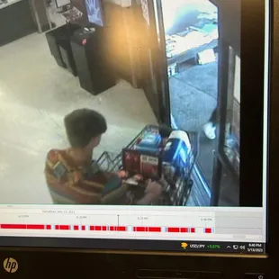 Thieves leaving the store with a full cart of unpaid for groceries.