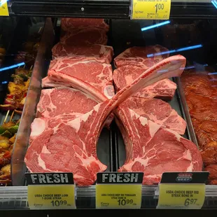 a display of meat in a grocery store
