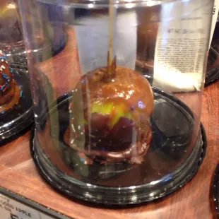Unappetizing carmel apple for sale.