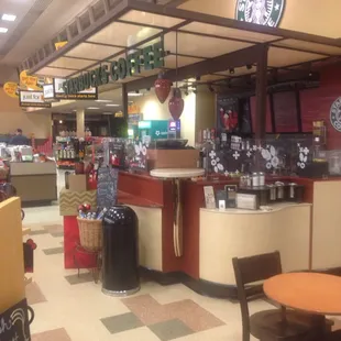 the inside of a starbucks coffee shop