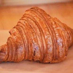 a croissant on a napkin