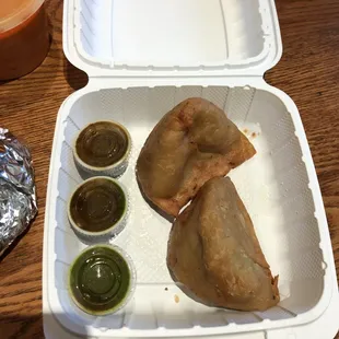 Samosas and the side sauces.