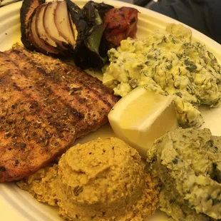 Grilled Salmon platter with delicious grilled vegetables, potato salad, onion and garlic hummus and Greek goddess hummus. YUMMY!