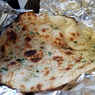 One of the best garlic naan in town! Made to order