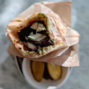 Beef and lamb brisket pita with house made pickles.  Very tasty
