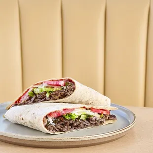 shawarma // lamb &amp; beef, lettuce, tomato, sumac onions, tahini, red ajika, laffa