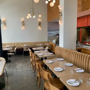 Larger tables near the front.