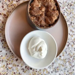 sour cherry cobbler, sweet cheese biscuit, tahitian vanilla whipped cream
