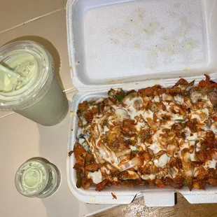 Chicken and Rice with spicy chutney sauce and an Avocado smoothie