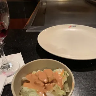 Got salad and a wine,  then waited an hour after that for a chef to come out!! Then, he didn&apos;t have enough food for the table!?!?!